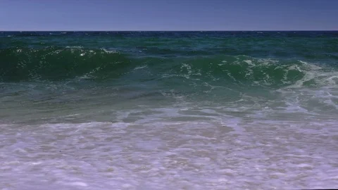 Storm on the sea, large waves roll on the sandy beach Stock Footage 94682072