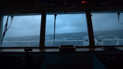 Storm at sea. Vessel's bridge. Windshield wiper works. Strong pitching. High Stock Footage 219826176