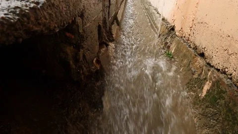 Storm sewerage during the rain. Environmental problems. 4k, slow-motion Stock Footage