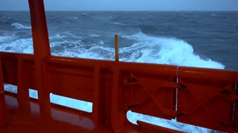 Storm. Side view from ship. Slow motion high waves and splashes. White foam on Stock Footage 205396296