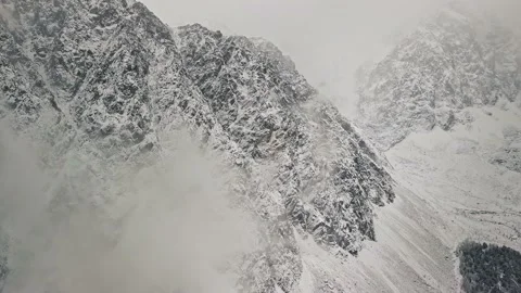 Storm, snowfall in the huge glacier of Mount Belukha, the valley of the Aktru Stock-Footage 163972028