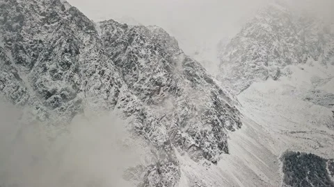 Storm, snowfall in the huge glacier of Mount Belukha, the valley of the Aktru Stock-Footage 163974071