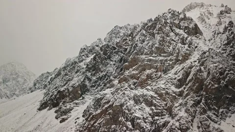Storm, snowfall in the huge glacier of Mount Belukha, the valley of the Aktru Stock-Footage 163974317