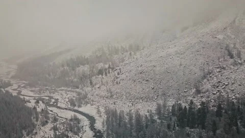 Storm, snowfall in the huge glacier of Mount Belukha, the valley of the Aktru Stock-Footage 164366493