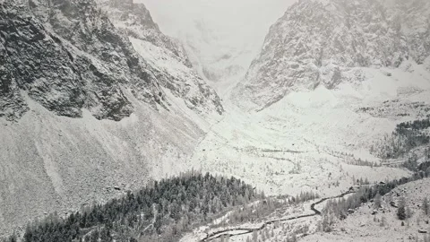 Storm, snowfall in the huge glacier of Mount Belukha, the valley of the Aktru Stock-Footage 164372409