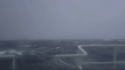 Storm. Strong pitching. High waves. Blur. Dark. White foam on the waves. Ship's Stock Footage 172034838