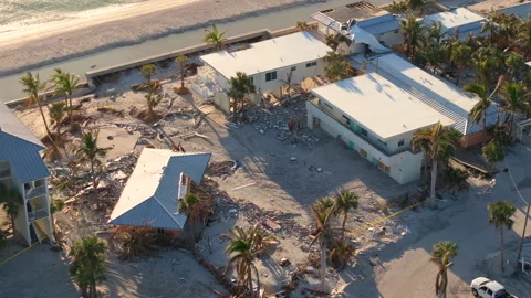 Storm surge caused by hurricane wind severe damaged residential houses Stock Footage 337440580