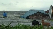 Storm Surge Flood Water Inundates Shanty Houses Stock Footage