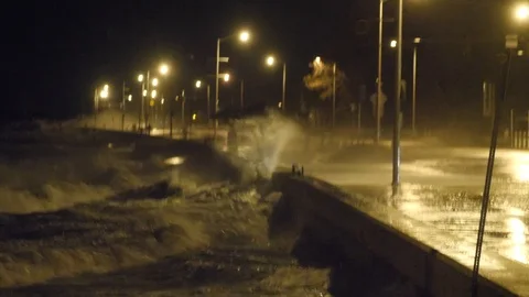 Storm Surge Sends Water Over Seawall Stock Footage