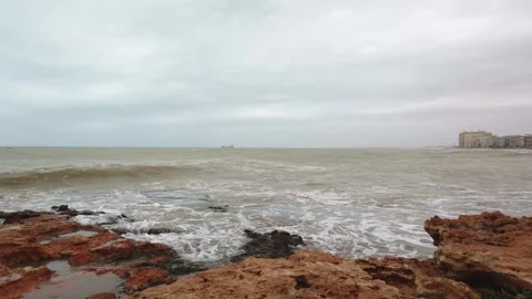 Storm Surge Waves Spill Over Harbor Sea Wall. 4K Stock Footage 133802060