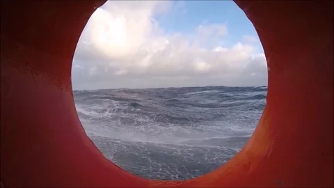 Storm Through Port Hole Stockbeeldmateriaal 83601480