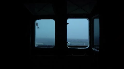 Storm. Vessel. Side windows cabin view. Splashes. Strong side pitching. High Stock Footage 196228454