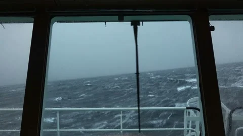 Storm. View from bridge of ship. Ship is rocking. High waves. White foam on the Stock Footage 153047003