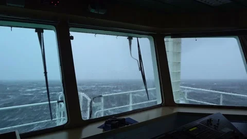 Storm. View from bridge of ship. Strong pitching. White foam on water. Stock Footage 165367353