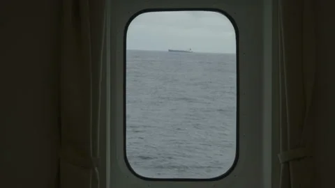 Storm view from cabin window. Ocean swell. Strong side pitching. Sea view from Stock Footage 172046788