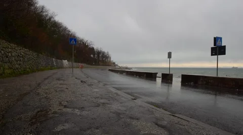 Storm warning on the sea coast, empty road, storm wind 스톡 동영상 60230178