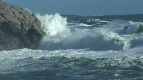 Storm waves breaking against rocks on ocean shoreline Stock Footage 46539775