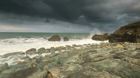 Storm waves crash against the rocks Stock Footage 33548885