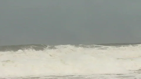 Storm waves crashing on to sandy beach Stock Footage 460849