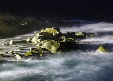 Storm waves at night Stock Photos