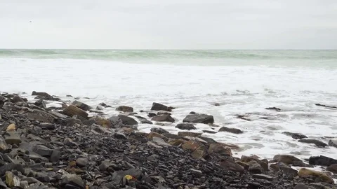 Storm waves in the ocean and the gray sky Stock Footage 83210649