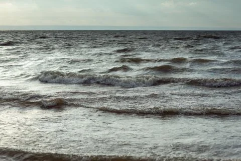 Storm waves on the river Stock Photos