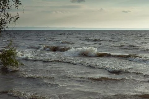 Storm waves on the river Stock Photos