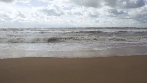 Storm waves on the shore in the shadow of a cloud Stock Footage 82121215