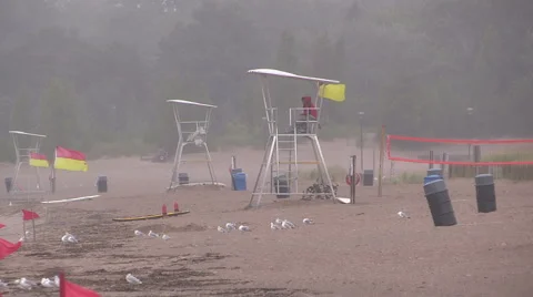 Storm wind cold summer day at the beach, big waves in Grand bend Ontario 2014 Stock Footage 40247977