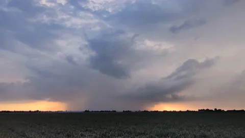Stormclouds in the evening light Stock Footage 204750295