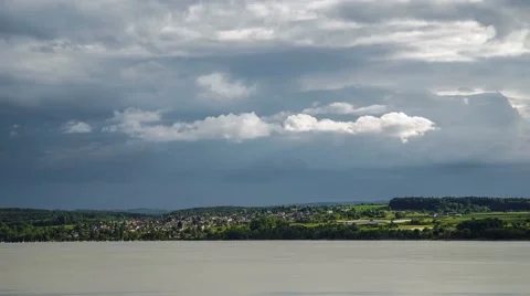 Stormclouds forming over Lake Constance in Germany - Time lapse Stock Footage 63954733