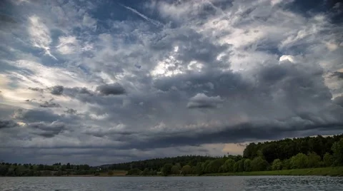 Stormclouds forming over a Lake in Germany - Time lapse Stock Footage 63950707
