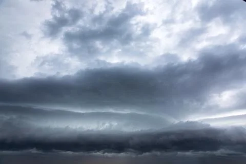Stormclouds gathering on the sky Stock Photos