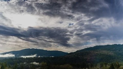 Storm's Embrace: A Dramatic Cloudscape Unfolds Stock Photos