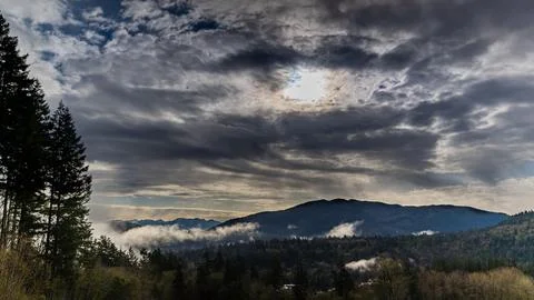 Storm's Embrace: A Dramatic Cloudscape Unfolds Stock Photos