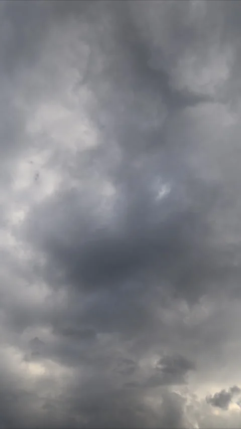 Storms intensify rapidly. Sky darkens as untamed storm clouds swiftly merge. Thr Stock Footage 337375735