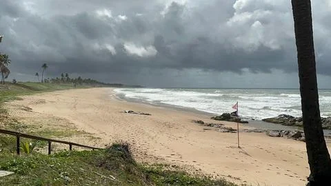 Stormy beach with cloudy sky Stock Photos