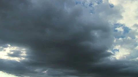 Stormy black clouds approach overhead to black Stock-Footage 40108594