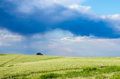 Stormy cloud over spring steppe Stock Photos