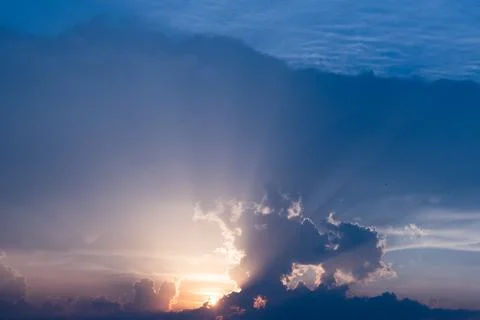 Stormy cloud. Sunset sky dramatic sunset clouds and sunset sunrays. Beautiful Stock Photos