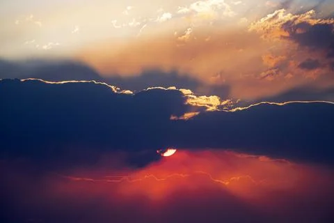 Stormy cloud. Sunset sky dramatic sunset clouds and sunset sunrays. Beautiful Stock Photos
