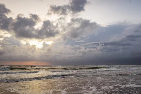 Stormy clouds along the beach Stock Photos