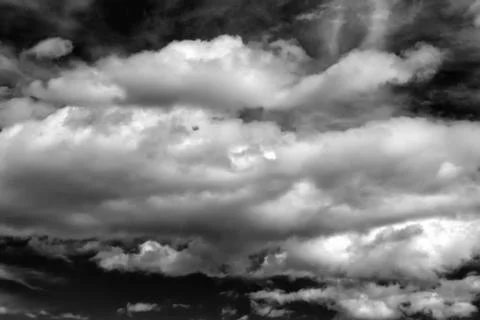 Stormy clouds on black background Stock Photos