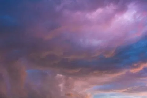 Stormy clouds in dramatic sky Stock Photos