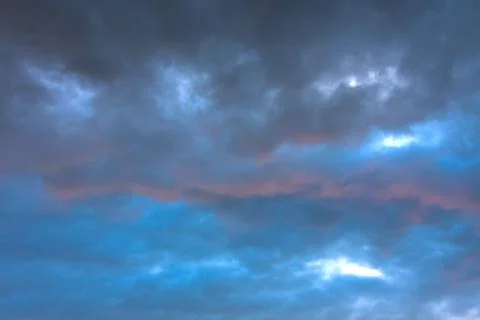 Stormy clouds in dramatic sky Stock Photos