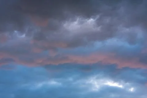 Stormy clouds in dramatic sky Stock Photos