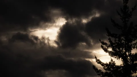 Stormy clouds moving fast in the morning sky Video stock 337675976