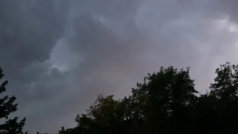Stormy clouds over forest in the summer season. thunder sounds and lightning Stock Footage 146521596