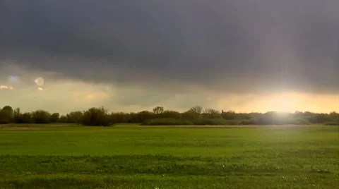 Stormy clouds over green meadow. Stock Footage 62840600