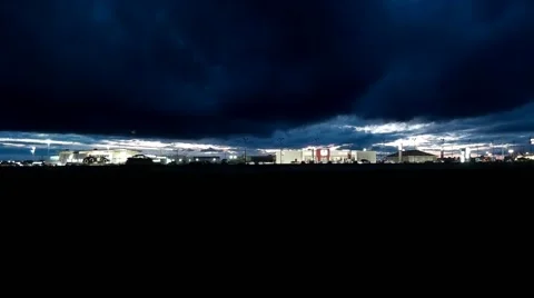 Stormy clouds over the highway at night Stock Footage 56775614